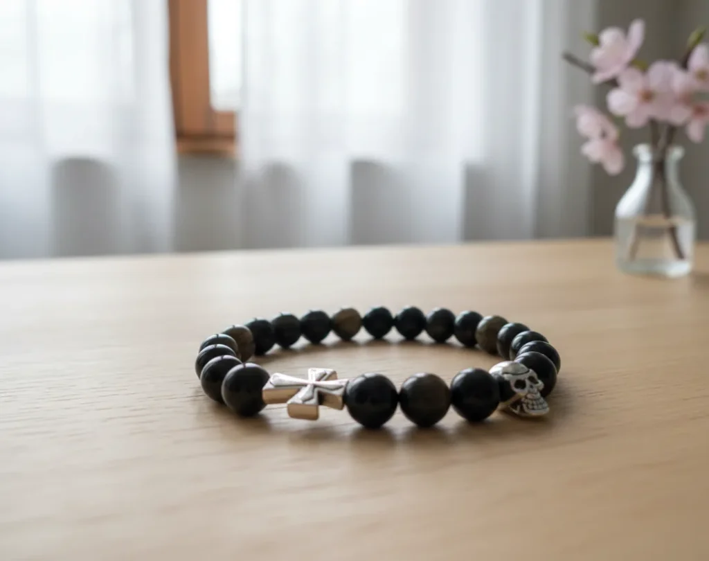 Bransoleta męska z kamienia obsydian czaszką i krzyżem